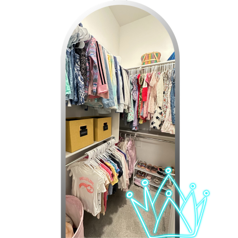 A well-organized child's closet with clothes and a crown, expertly arranged by a professional organizer.