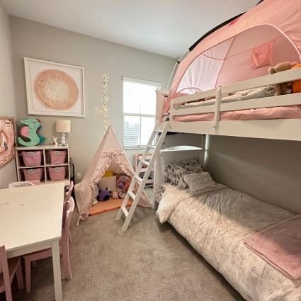 A professional organizer transforms a girl's room with bunk beds and optimizes the closets for better organization.