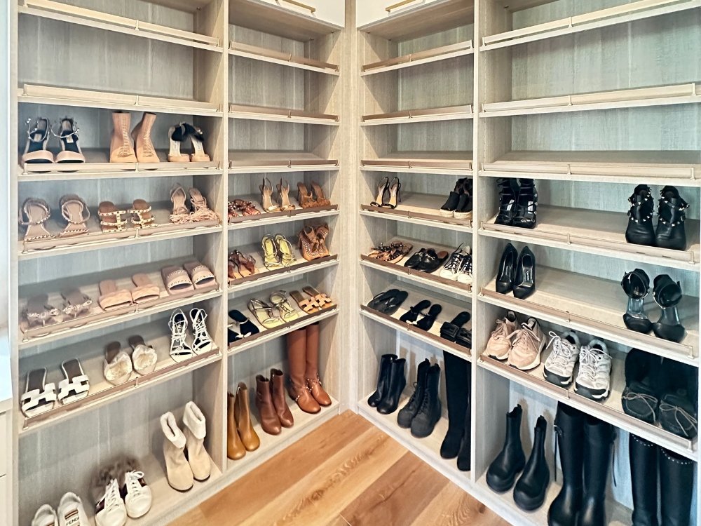 Kelly's shared closet filled with shoes and boots.